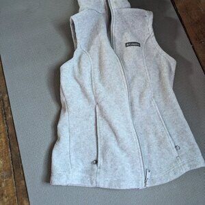 Jeans and Columbia jacket without sleeves